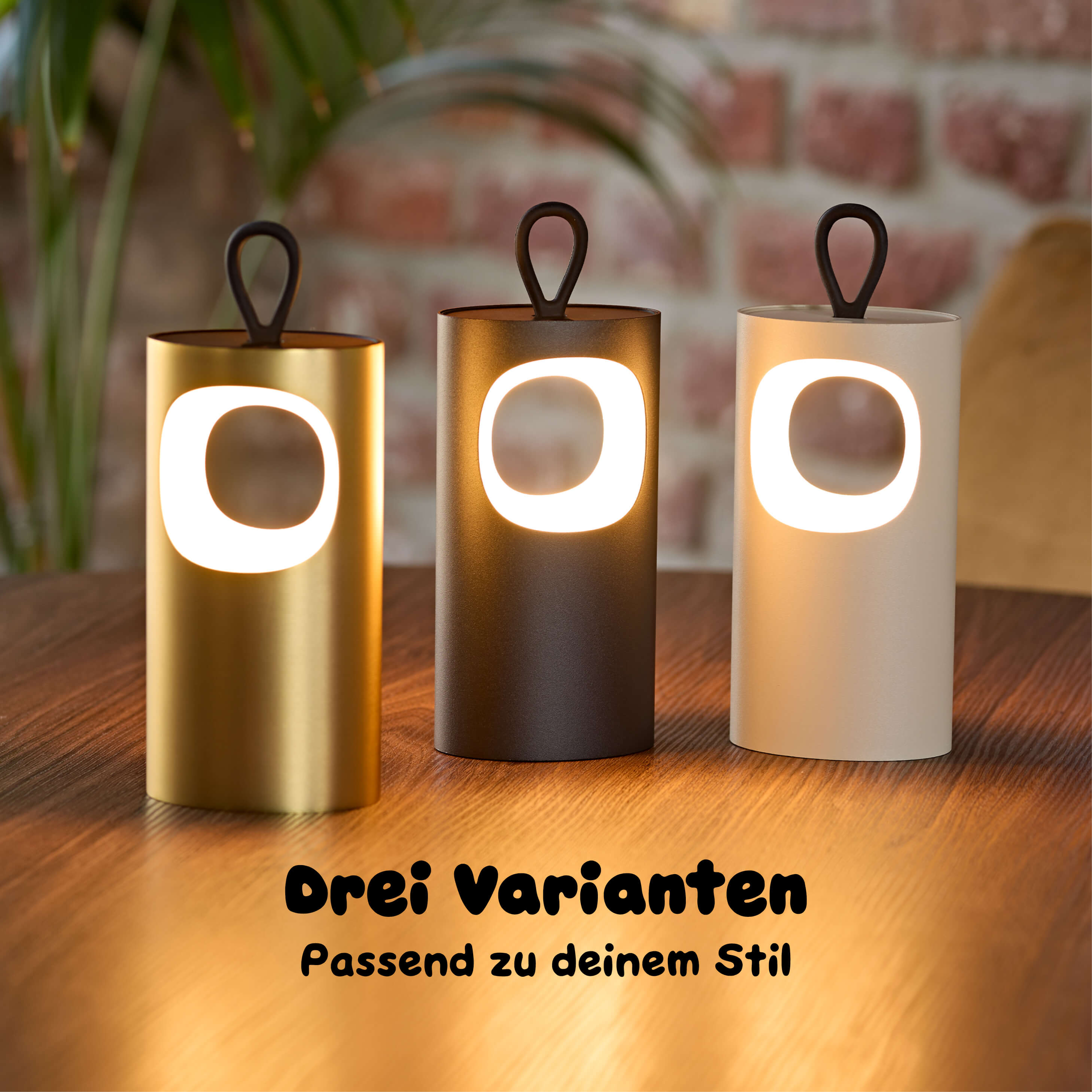 Drei Sigor Lunari Akku-LED-Tischleuchten in den verfügbaren Farben  matt schimmerndem Gold, Nachtschwarz und Dünenbeige 